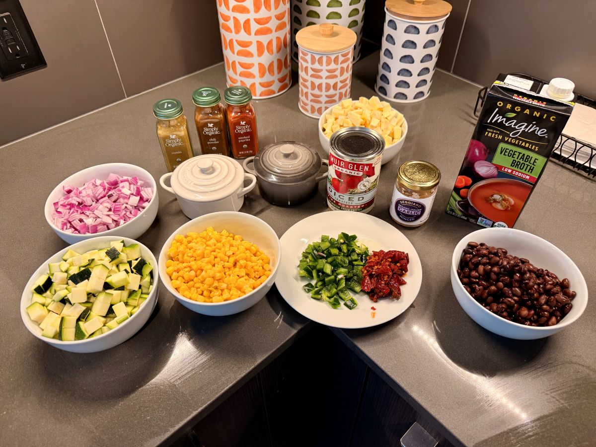 Mise en place of parsnips, onions, and zucchini
